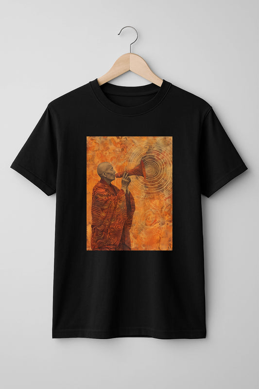 Black t-shirt with a graphic of a monk on an orange background, hanging on a wooden hanger against a gray background.