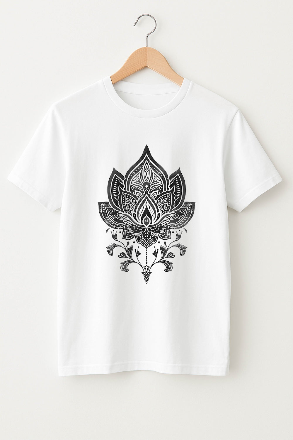 White t-shirt with black lotus flower design on a hanger against a white background