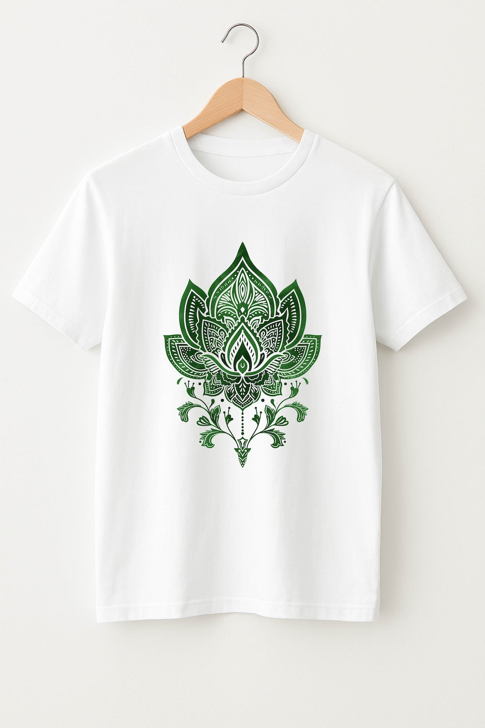 White t-shirt with green lotus flower design on a hanger against a white background